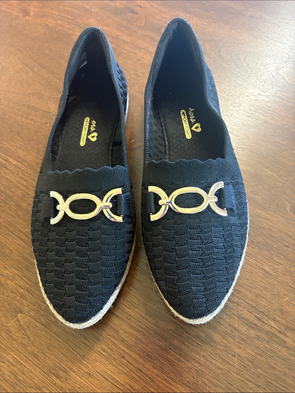 Like new Skechers black woven stretch flats with gold buckle